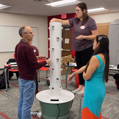 Steve training teachers how to use a Tower Garden